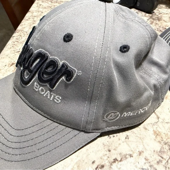 Ranger Boats, Simme Fishing, Patagonia, and Costa hats. - Picture 3 of 7